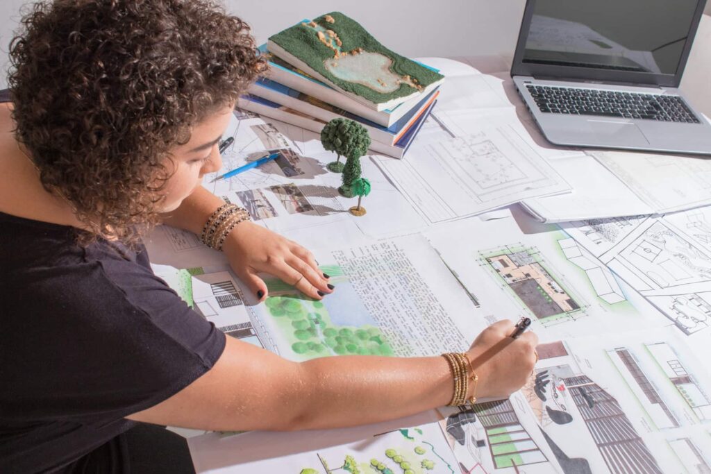 A landscape architect working on a custom residential landscaping project.