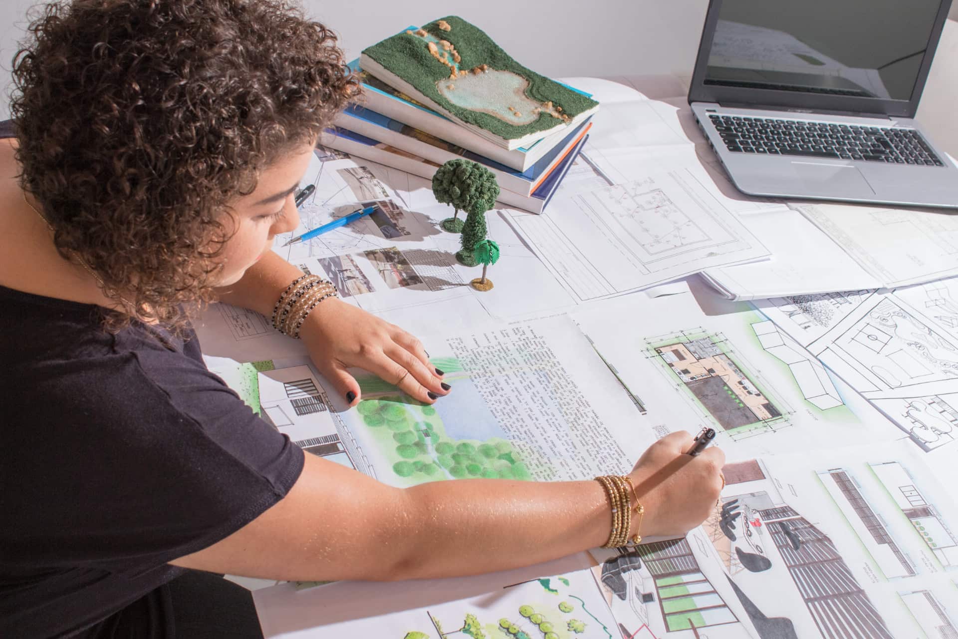 A landscape architect working on a custom residential landscaping project.